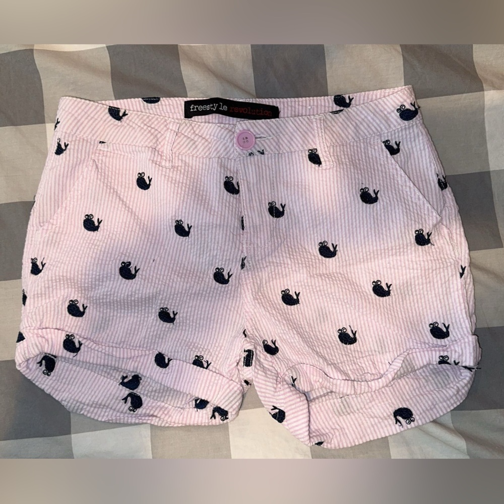 Pink seersucker shorts with navy blue whales